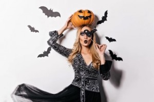 interested-long-haired-girl-holding-orange-pumpkin-halloween-photoshoot-indoor-photo-appealing-blonde-lady-witch-costume_197531-15961 Small