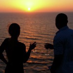 silhouette-of-happy-couple-standing-near-the-sea-and-take-a-photo-during-sunset-girlfriend-and-boyfriend-during-romantic-date-moment-love-concept-of-peace-or-quiet-vacation-for-loving-hearts-jan-pavlovski